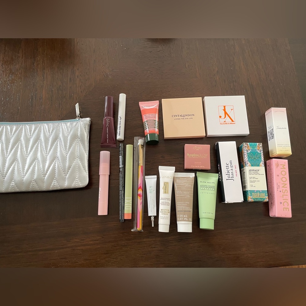 Assorted Beauty Products with Silver Quilted Pouch